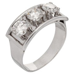 Contemporary Platinum Three Stone Brilliant Cut Diamond Ring