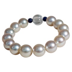 【Lustre Arc】Bracelet extensible avec perle dorée crémeuse des mers du Sud