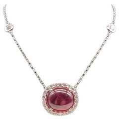Stunning Cabochon Ruby Pendant in a Diamond Halo Setting