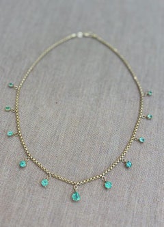 Collana con frange di smeraldi, oro 14k