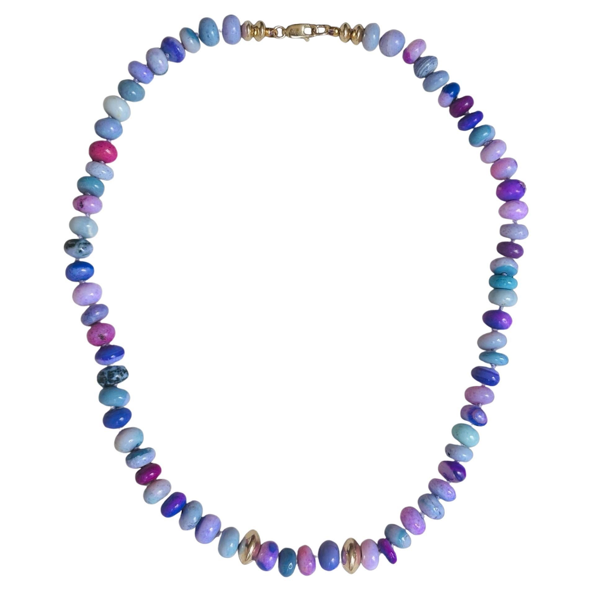 Collana Candy Opal

Opali misti, oro 14k

16