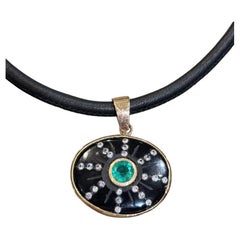 Ciondolo SOL, onice nera, smeraldo, diamanti, oro 14k