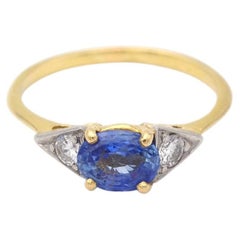 Certified 0.75 ct Ceylon sapphire trilogy ring in 18 karat gold