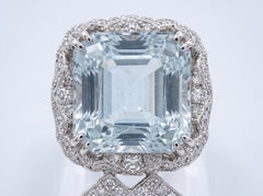 Orecchini a cascata con diamanti antichi e acquamarina in oro bianco 18 carati