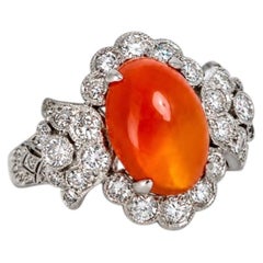 Bague en or blanc 18 carats avec opale de feu mexicaine et diamants