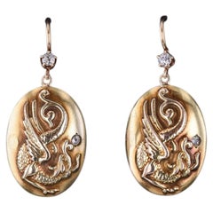 Pendientes antiguos con forma de grifo, de oro de 10k y 14k, de alrededor de 1900