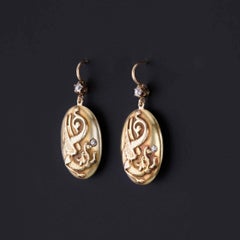 Pendientes antiguos con forma de grifo, de oro de 10k y 14k, de alrededor de 1900