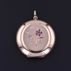 Médaillon ancien à fleurs en or rose 14 carats