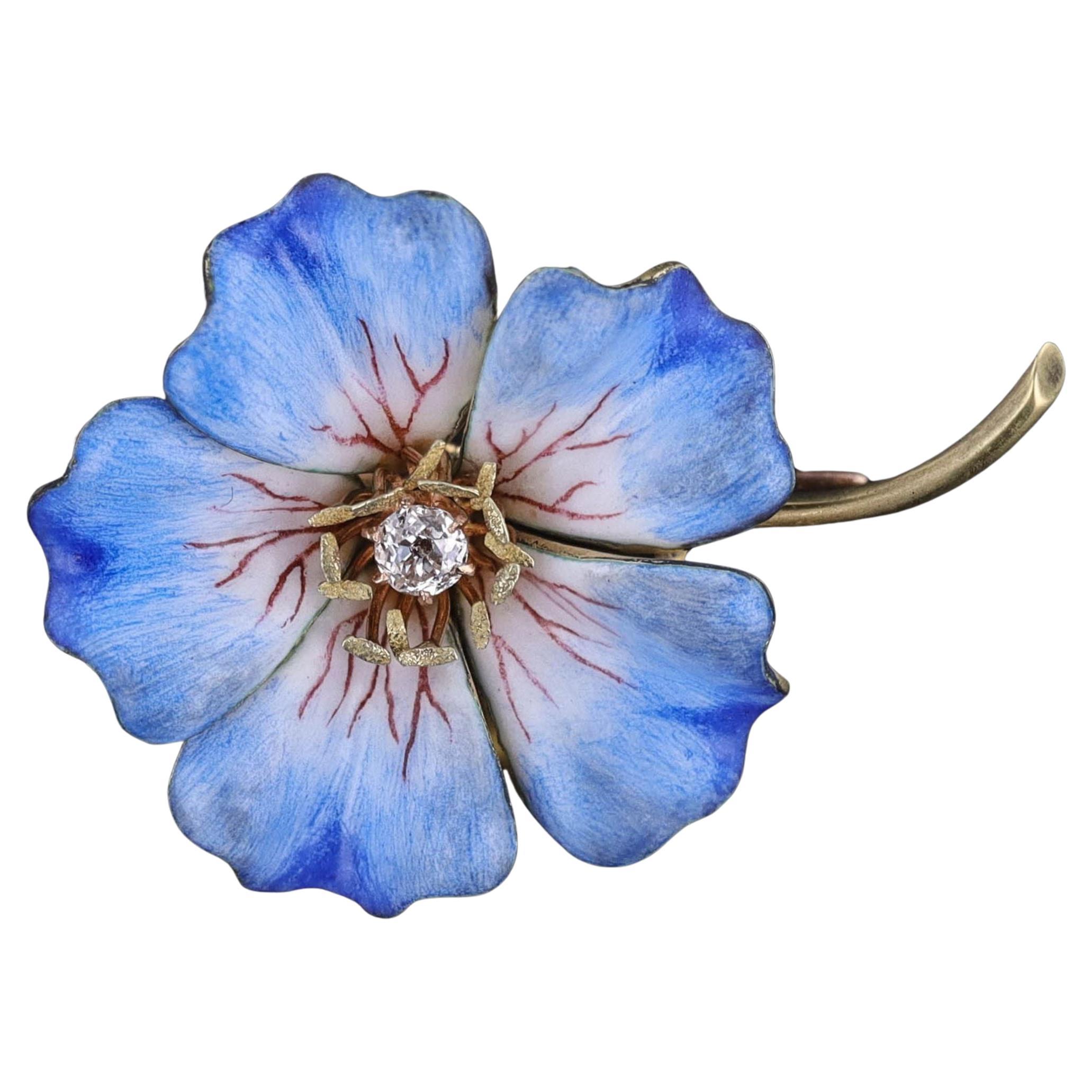 Broche fleur ancienne en or 18 carats et émail
