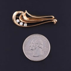Broche vintage en or 14 carats sertie de diamants