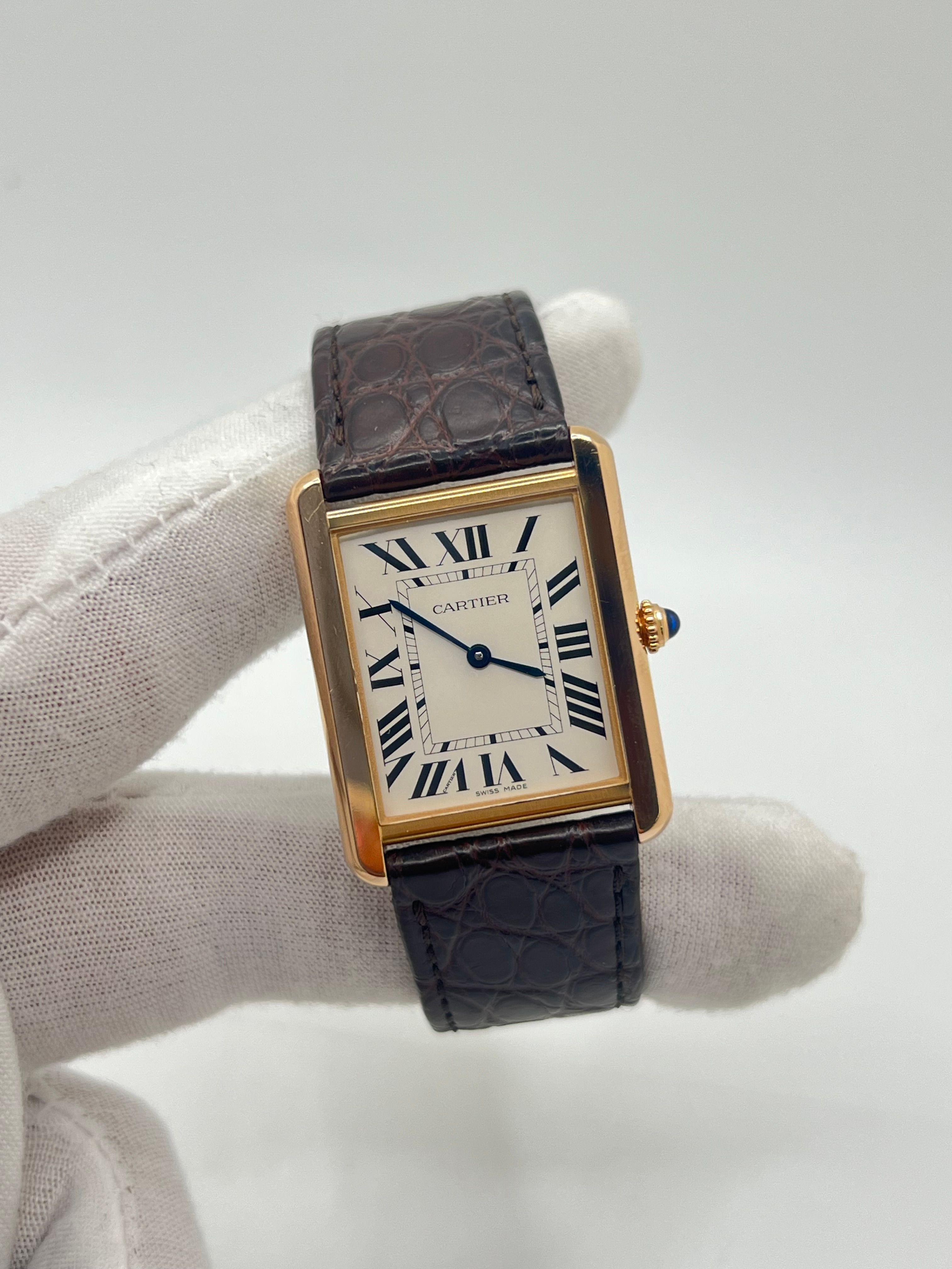 The Cartier Tank Solo ref. 3167 in 18K yellow gold is a stunning example of timeless elegance. This watch, in excellent condition and barely worn, perfectly showcases Cartier’s signature design with its clean lines and iconic Roman numeral dial.