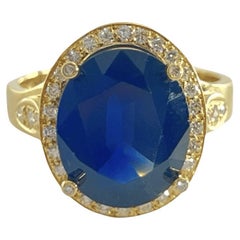 Yellow Gold Ring with 7-Carat Sapphire and Diamonds