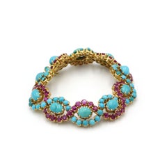 Bracciale vintage in oro giallo 18 carati con rubini e turchesi
