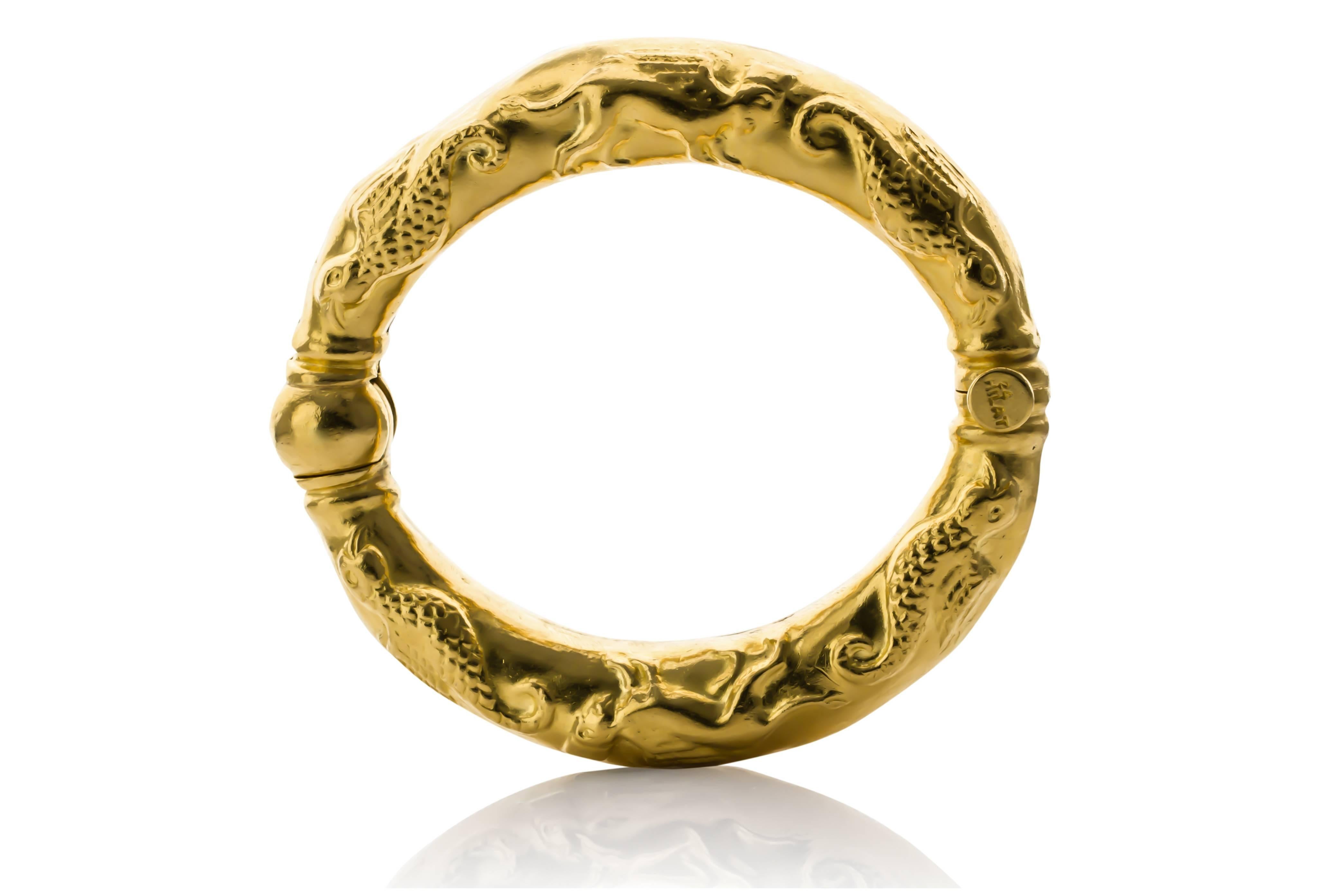 Estate 24K yellow gold babylon hinged animal patterned bracelet, by Hilat.  41.2 dwt. 