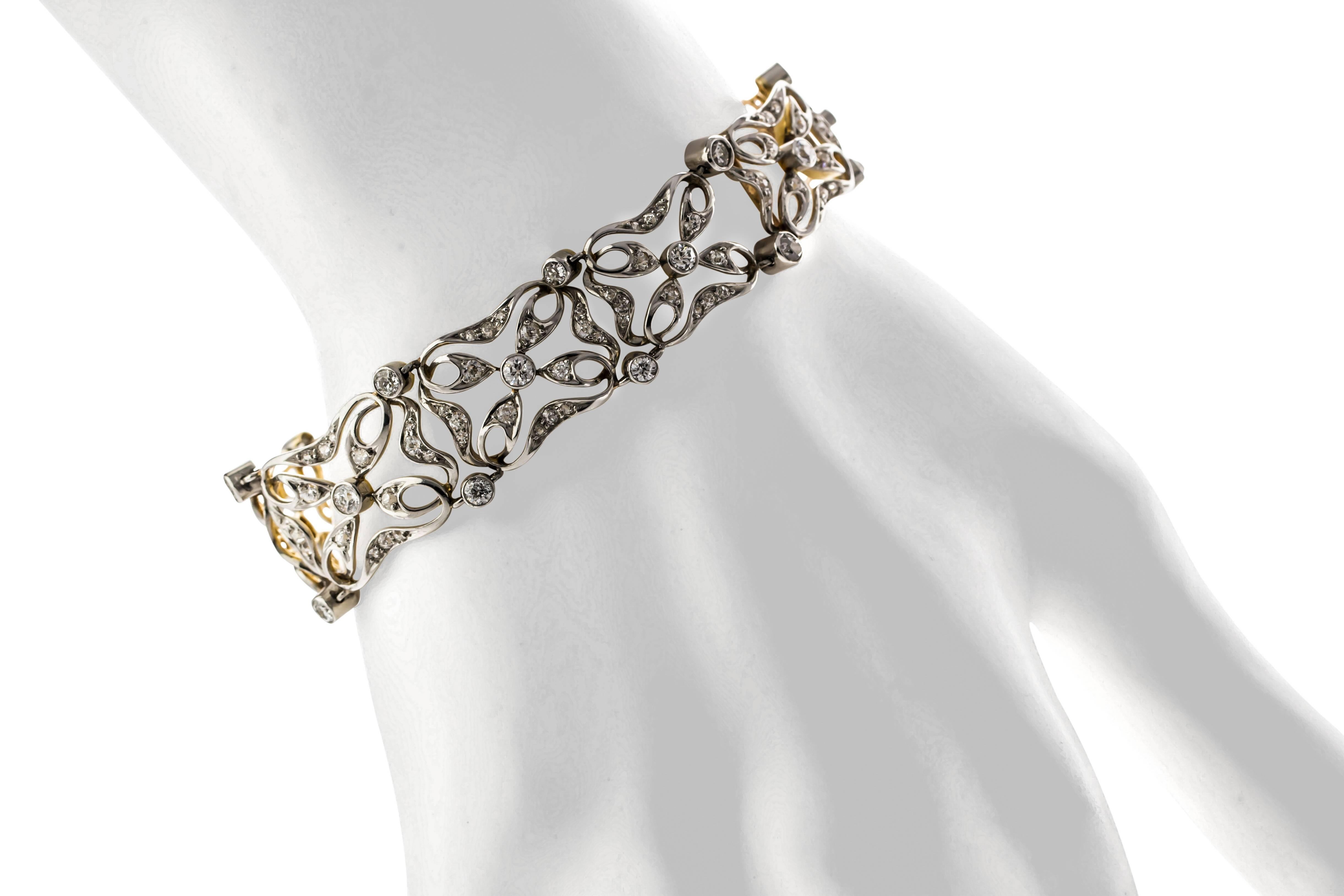 Estate Platinum and 18K yellow gold diamond Edwardian 6.5" bracelet.  Set with approximately 4.50 carats total weight.