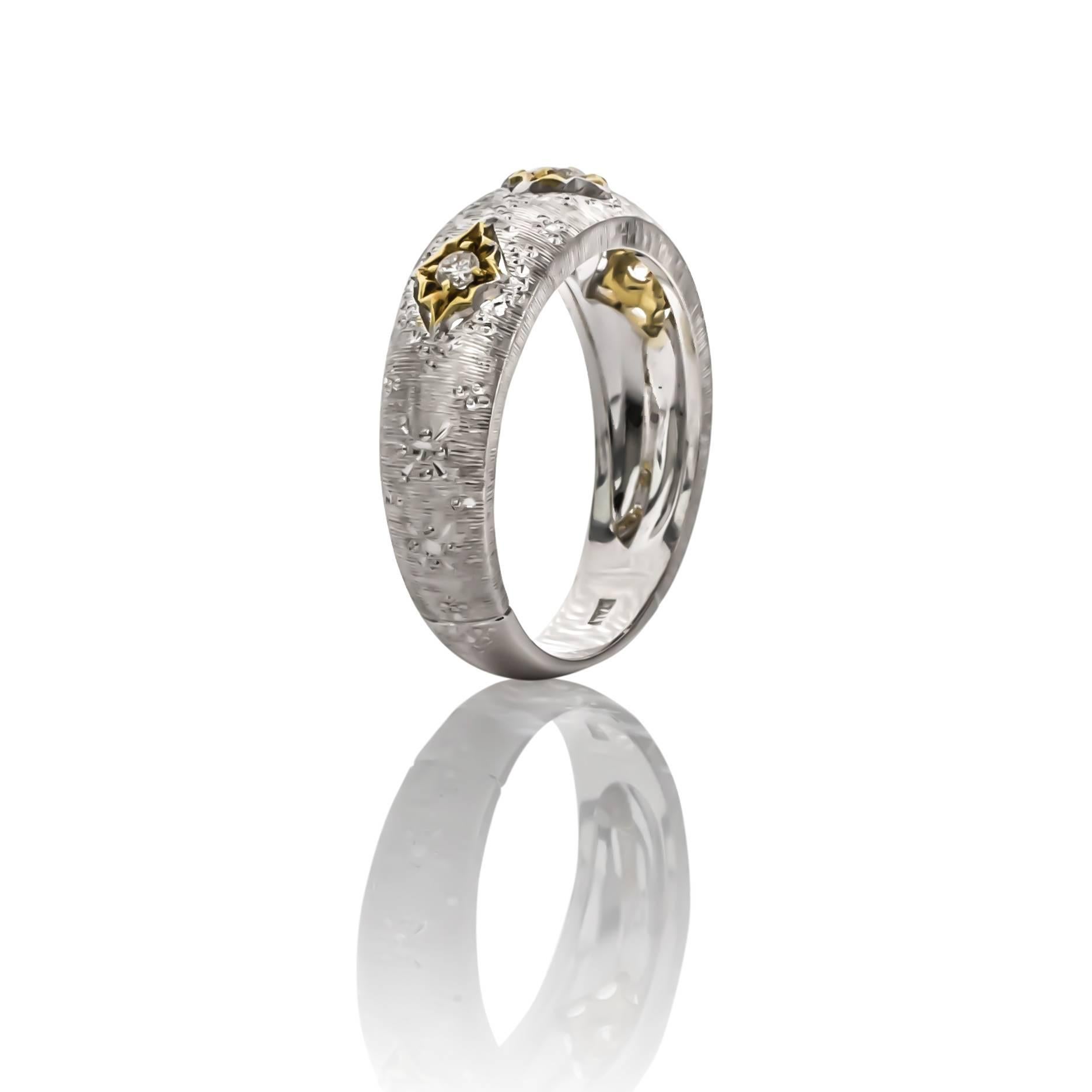New: 18K white and yellow gold diamond ring, designed by F Vergano.  Set with round brilliant cut diamonds weighing .11 carats total weight, F-G color and VS clarity.

Finger size 7