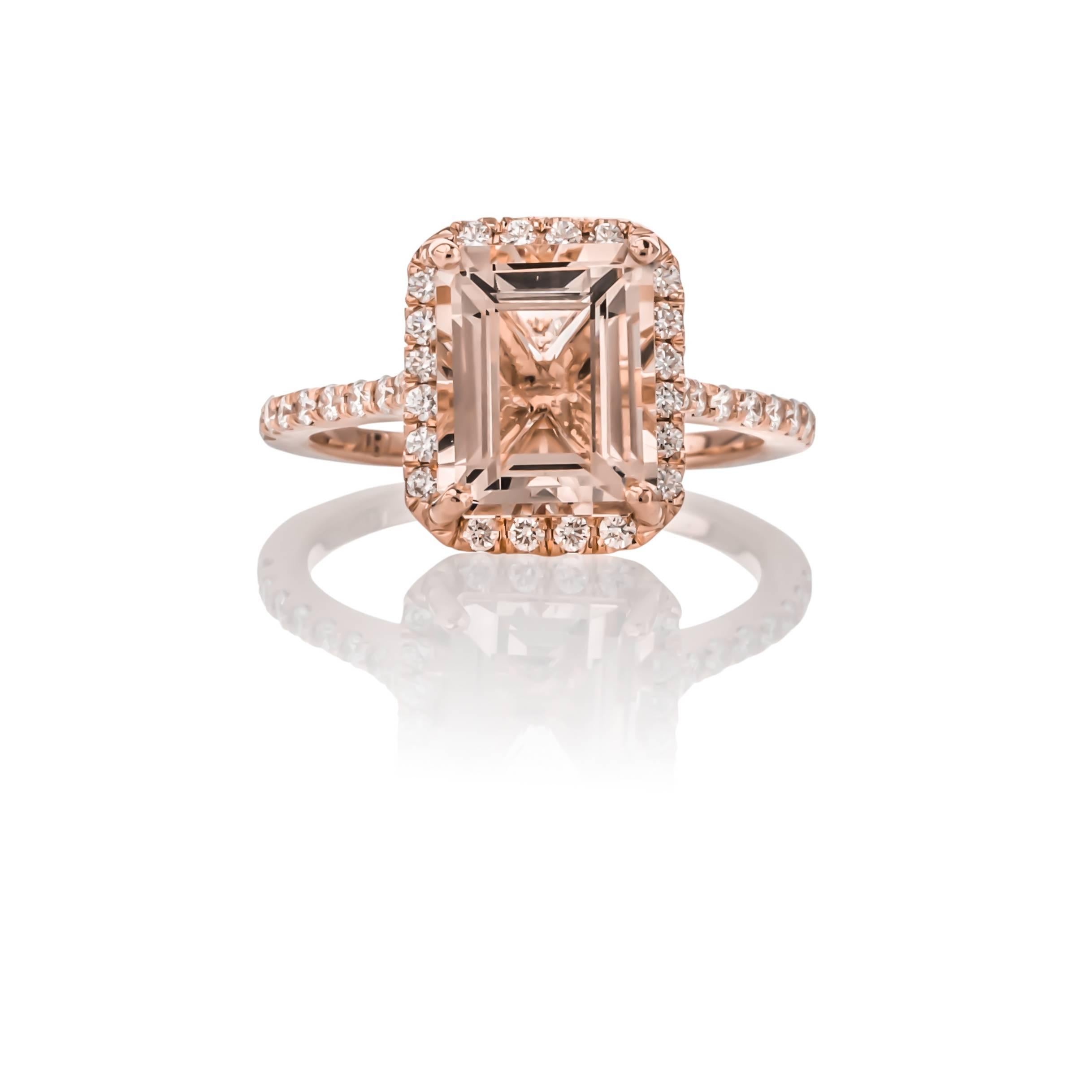 Brand New: One of kind 18K rose gold morganite and diamond ring. Set with one emerald cut morganite weighing 3.58 carats of fine color and clarity, surrounded by forty-six round brilliant cut diamonds weighing .53 carats total weight, G color and VS