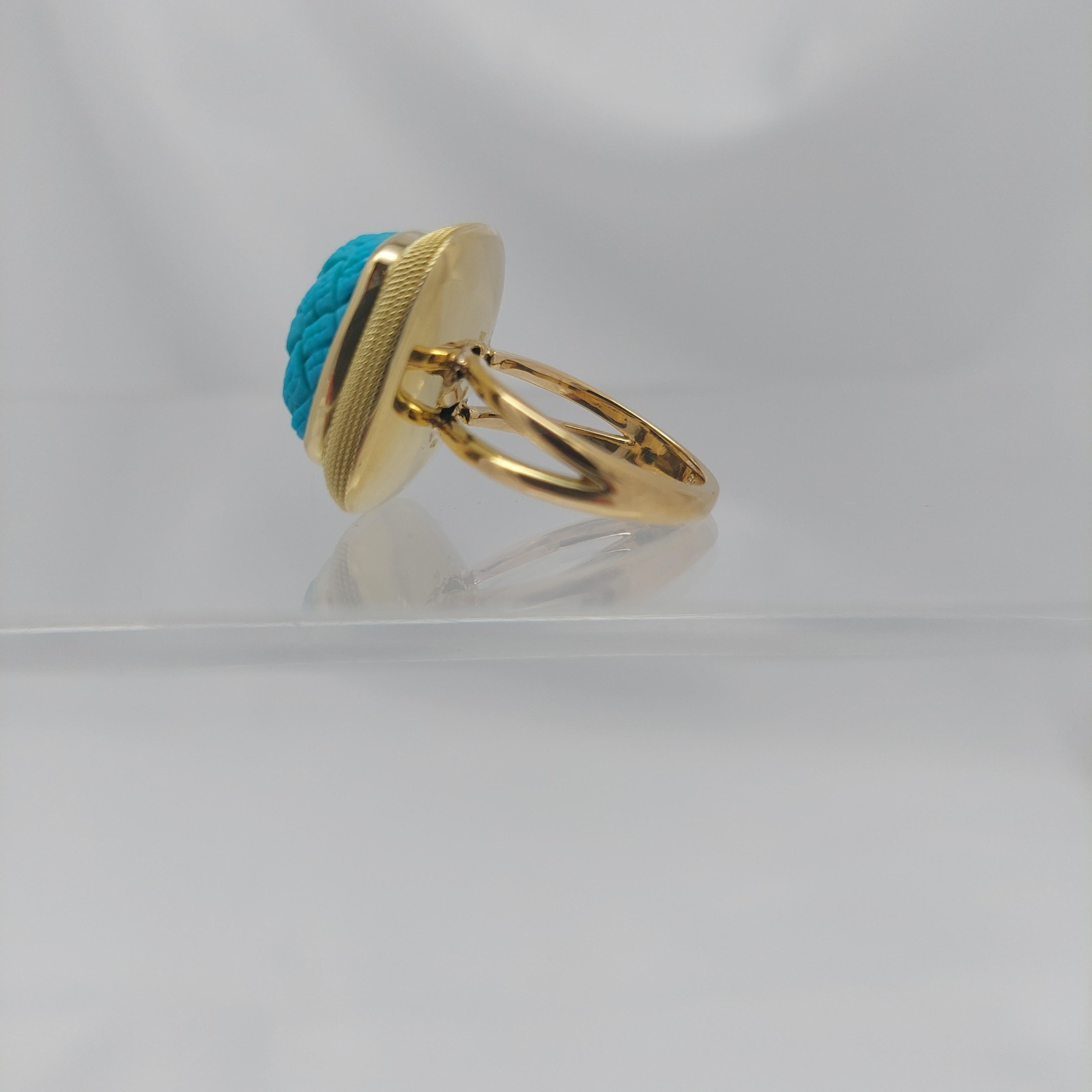 Anello in turchese intagliato 