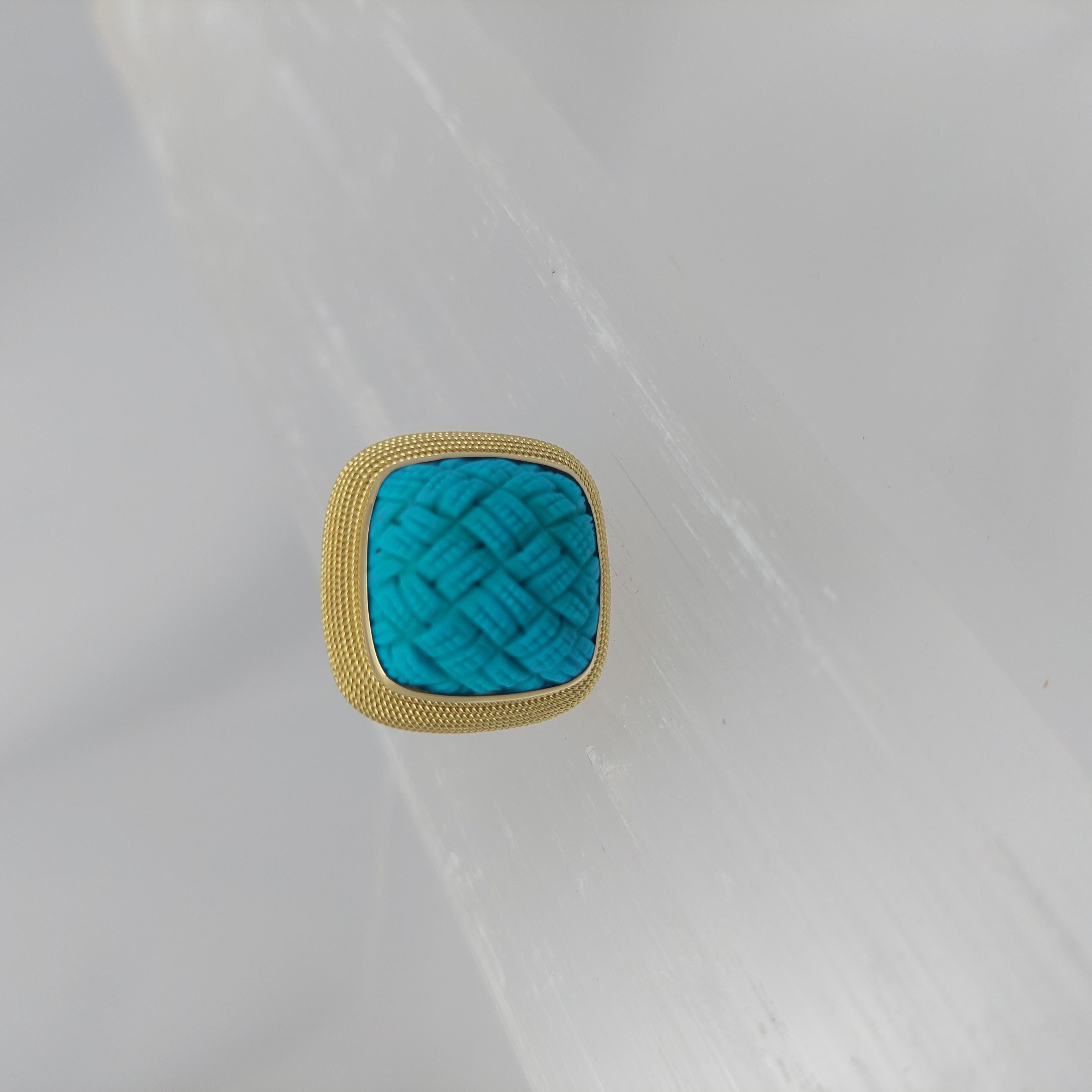 Anello in turchese intagliato 
