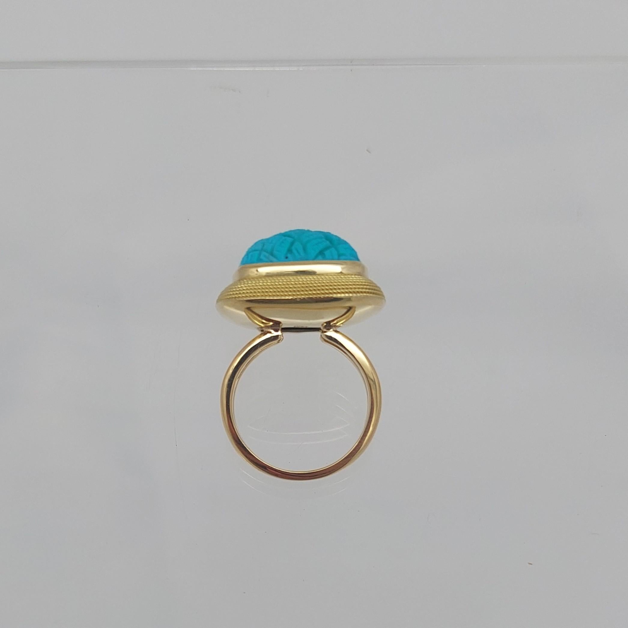 Anello in turchese intagliato 
