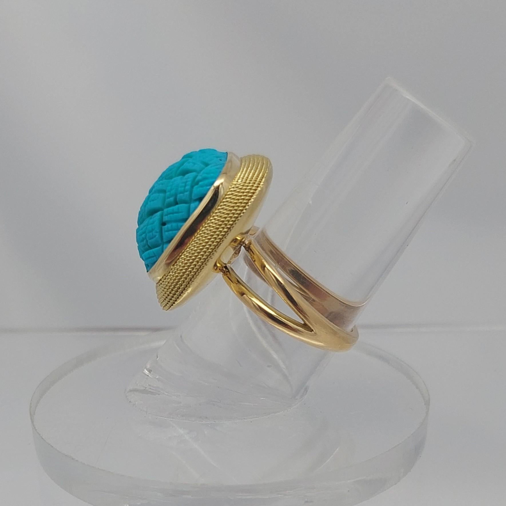Anello in turchese intagliato 