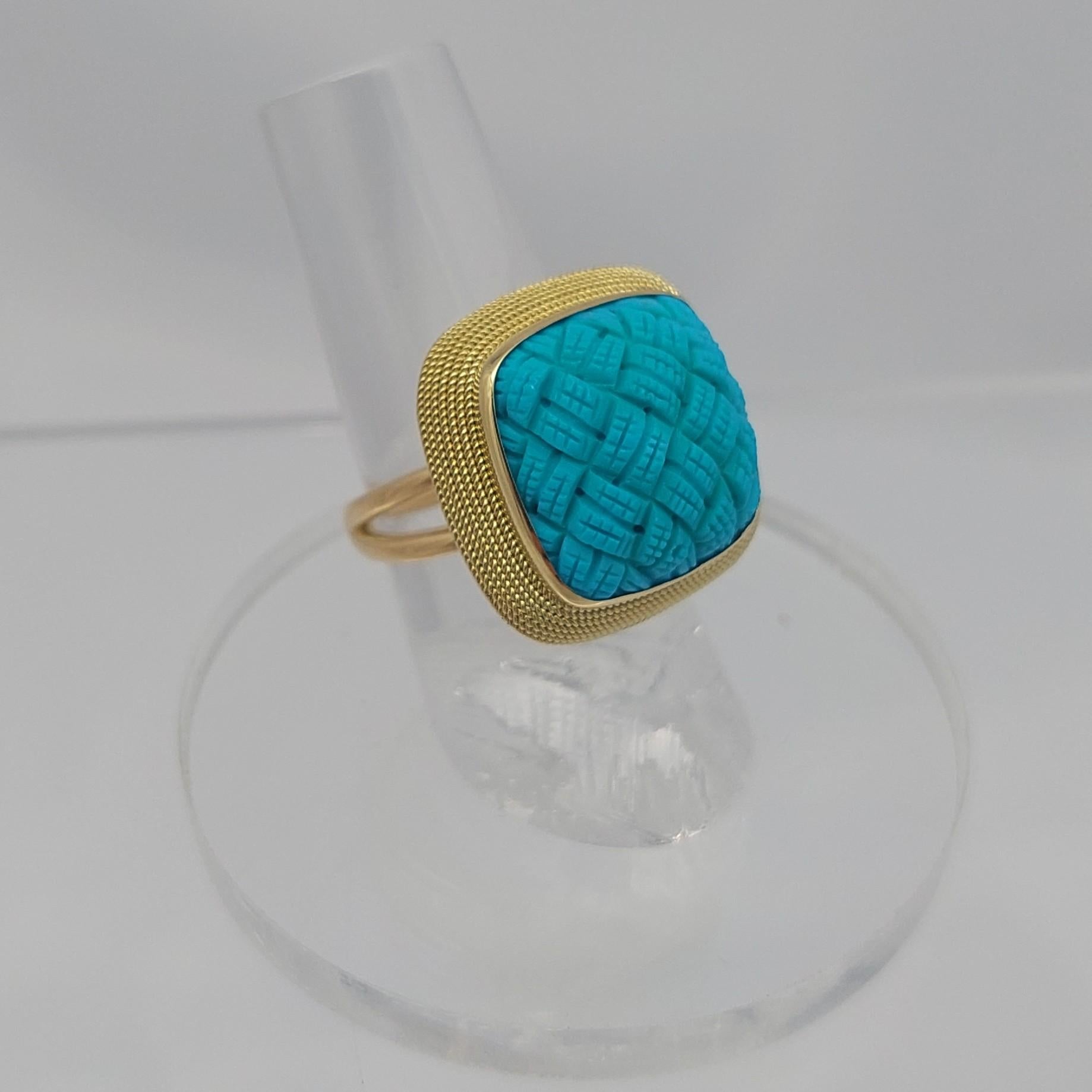 Anello in turchese intagliato 