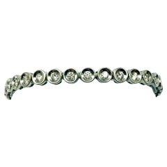 750 white gold tennis bracelet with diamonds