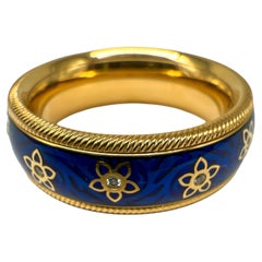 Wellendorff ring in 18-carat yellow gold with diamonds and cold enamel