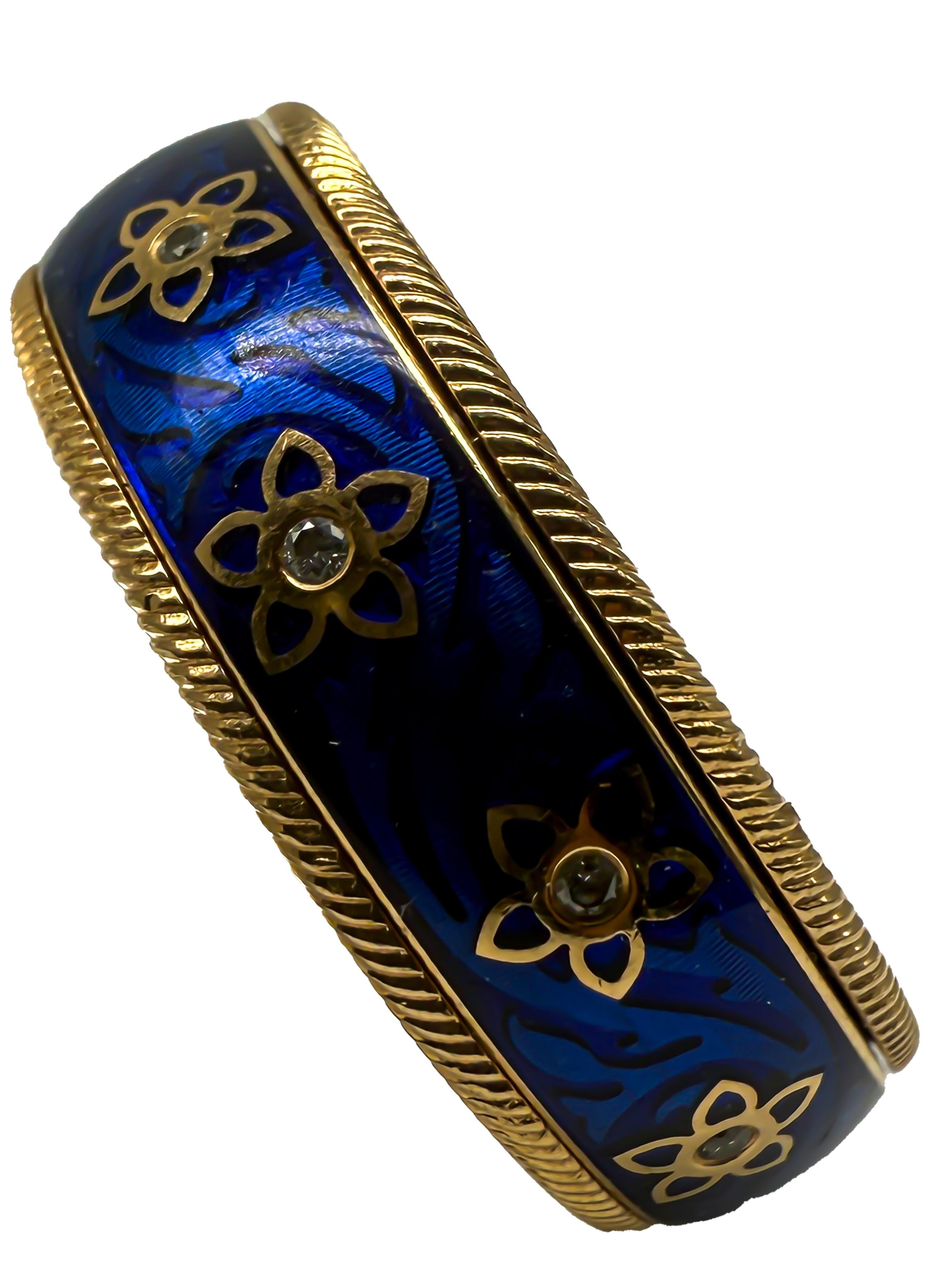 Anello Wellendorff in oro giallo 18 carati con diamanti - design rotante

Questo squisito anello di Wellendorff colpisce per la sua maestria artigianale e per l'eccezionale comodità del suo caratteristico design rotante. Realizzato in solido oro