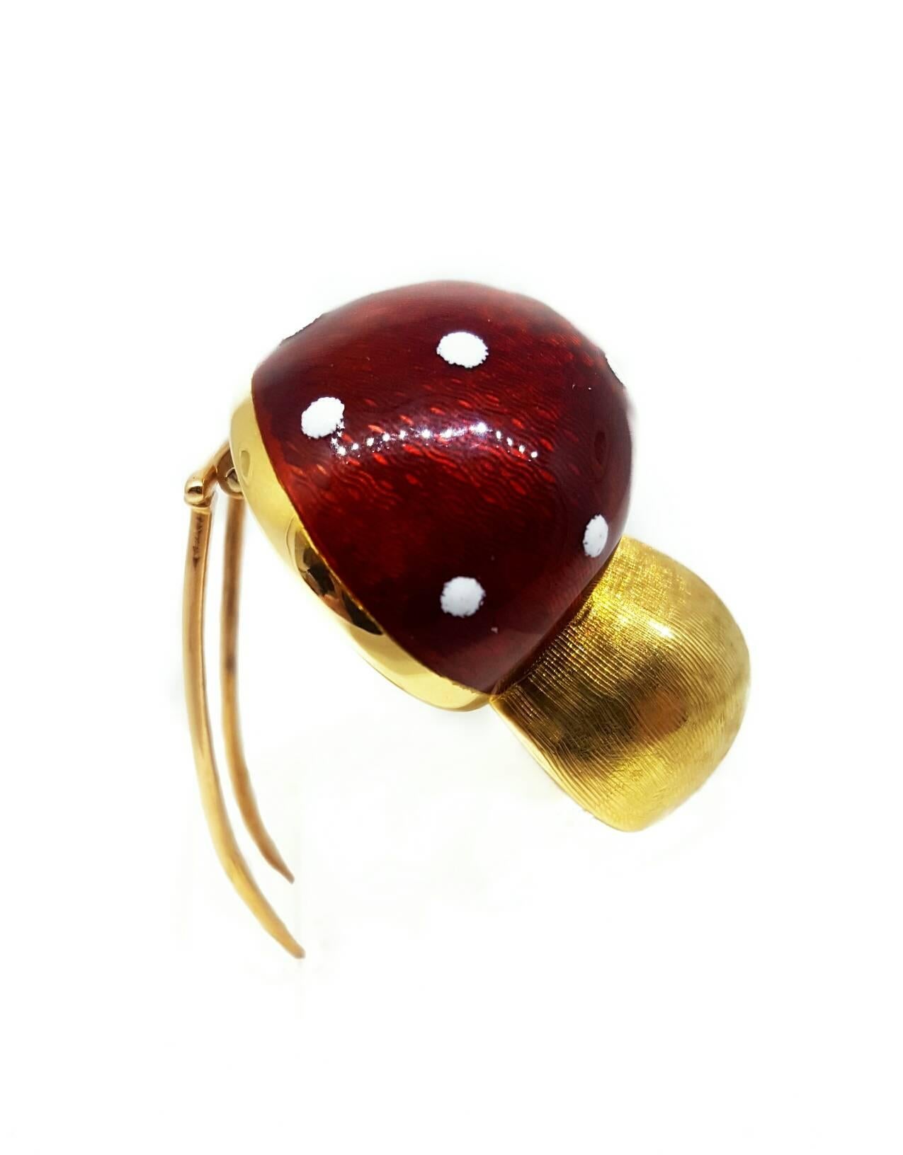 A one-of-a-kind, Italian designed, 18 karat yellow gold and enamel brooch. In an original mushroom design, the brooch is 1 inch in length and 1 inch wide. This design features two pins to fashion the brooch in place. This piece weighs 16.9g