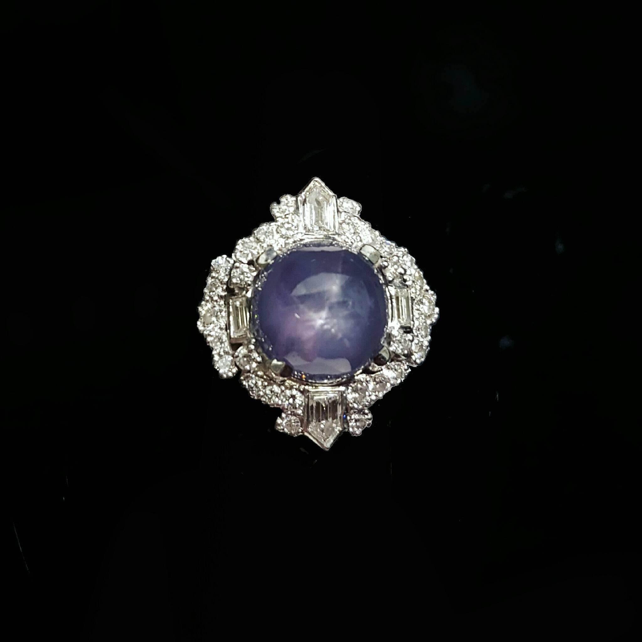 A beautiful one-of-a-kind platinum mounting set with 1.60 carats of diamonds and a large 24 carat Star Sapphire. Star Sapphires are a rare variety of sapphire that exhibit a phenomenon known as asterism under specific lighting. The display of