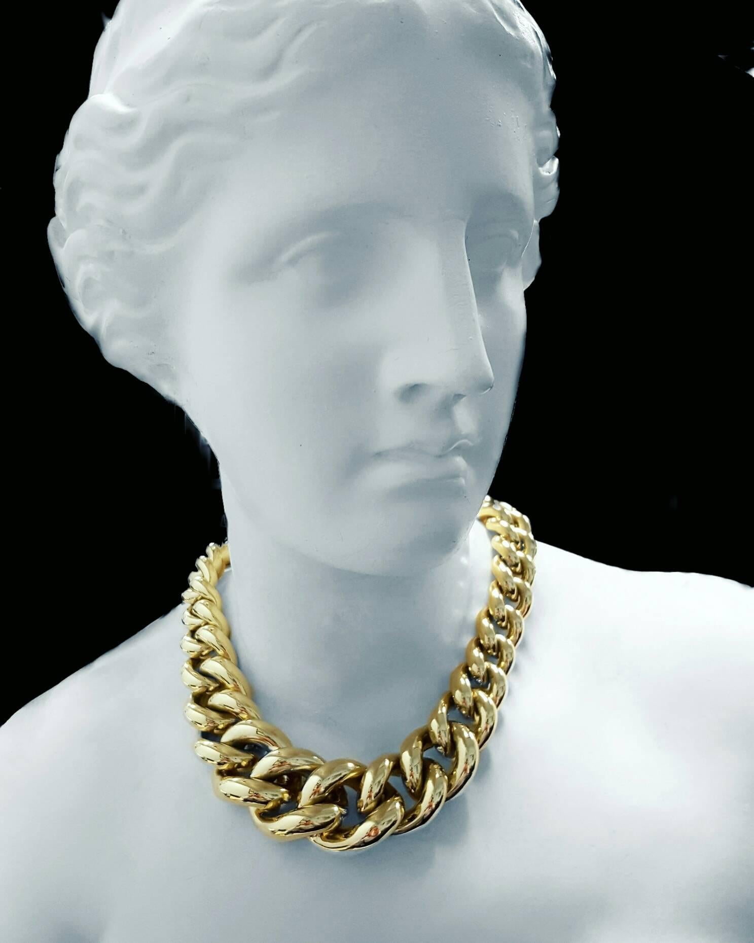 This necklace is big, bold, and beautiful! The necklace is made out of 18 karat yellow gold and measures 17.5 inches. The widest link in the necklace measures 28mm (1.10 inches) and tapers down to the smallest link which measures 18.5mm (0.72