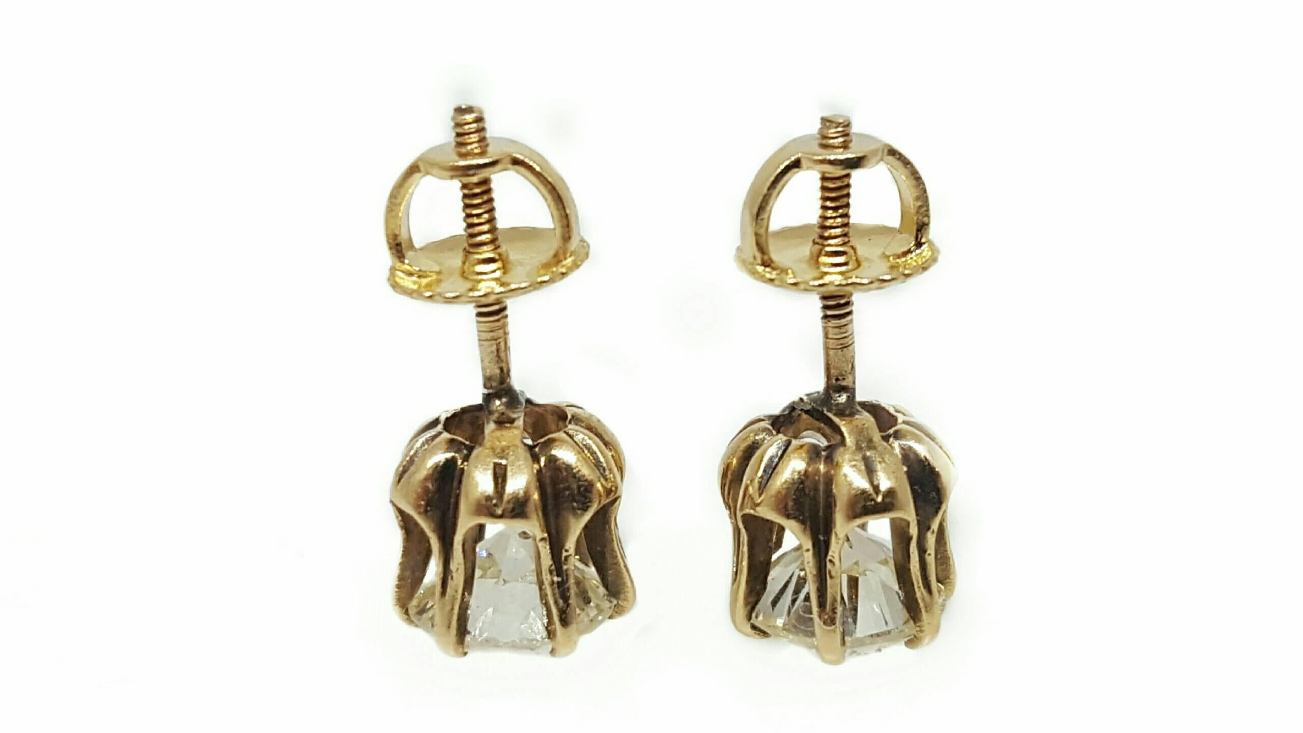 A pair of Old European cut diamonds in their original yellow gold mountings from the early 1900's. The earrings have six prongs each and screw-back posts. The diamonds are VS2 to SI1clarity with K to L color and an approximate weight of 1.55cttw.