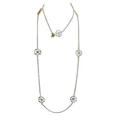 Long necklace collection Prehistoric Perforated Disk