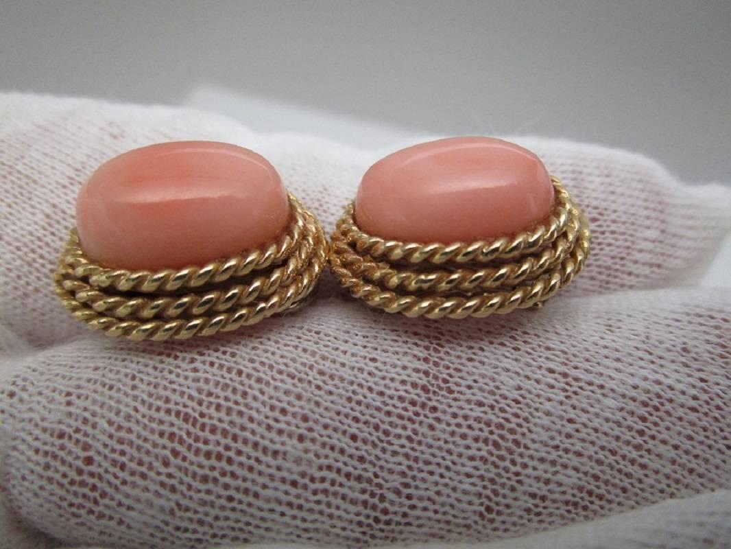 A lovely Angel Skin Coral Earrings 14K yellow gold with Omega Post Back Clips
The Coral measure 13.8 mm x 9.8 mm
High lustre, well matched material, Slight minor wear to the coral
c 1960's
Guaranteed to be natural and undyed coral
Although the