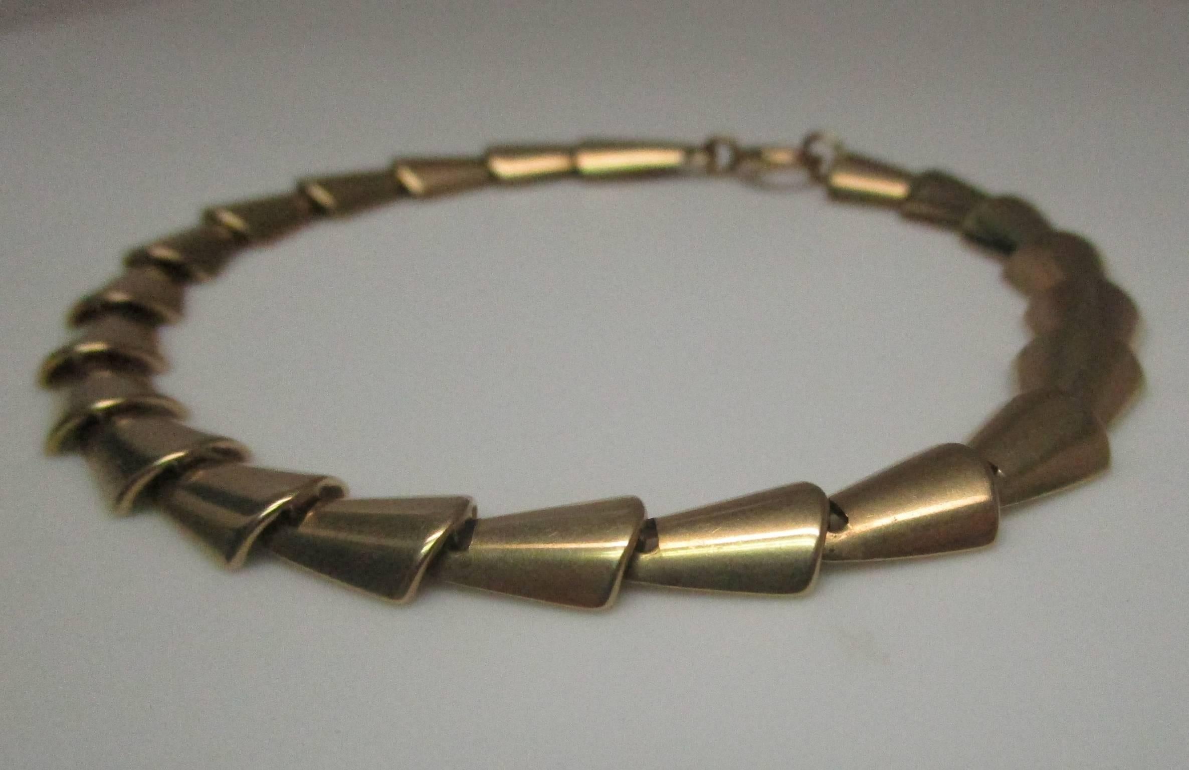 This bracelet is a marked Tiffany Art Deco/ Retro piece. It is fluid and comfortable to wear. Style like this never goes out of fashion and would look equally becoming at a dinner party or quick trip to the store. This is going to be your go-to