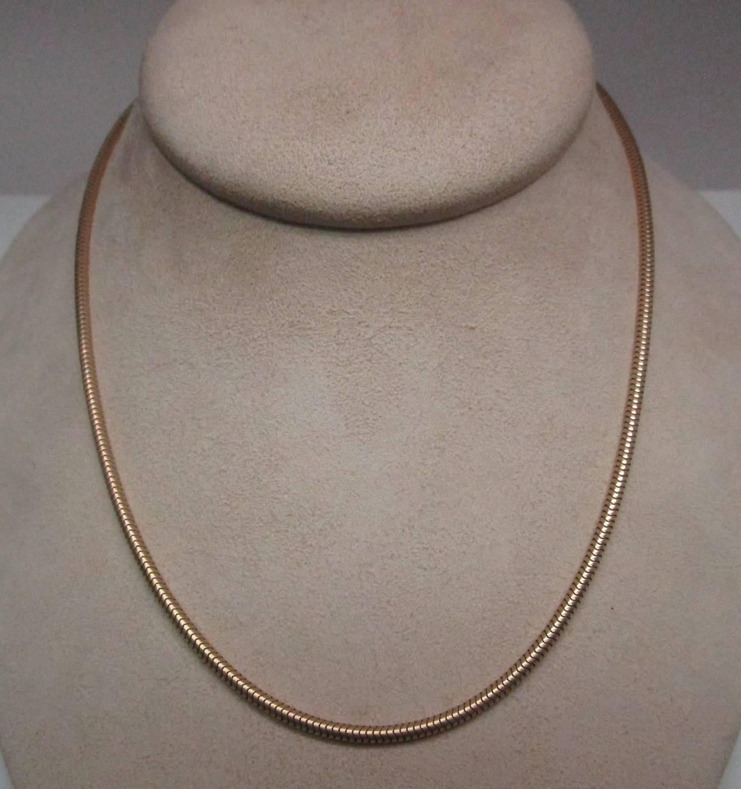 This glorious chain from Tiffany & Co is as classic as you get.  It is as beautiful as the day they produced it. The 14 karat gold will allow you to pair this chain with even the most modern pendant. It is a stout chain that lays well with or