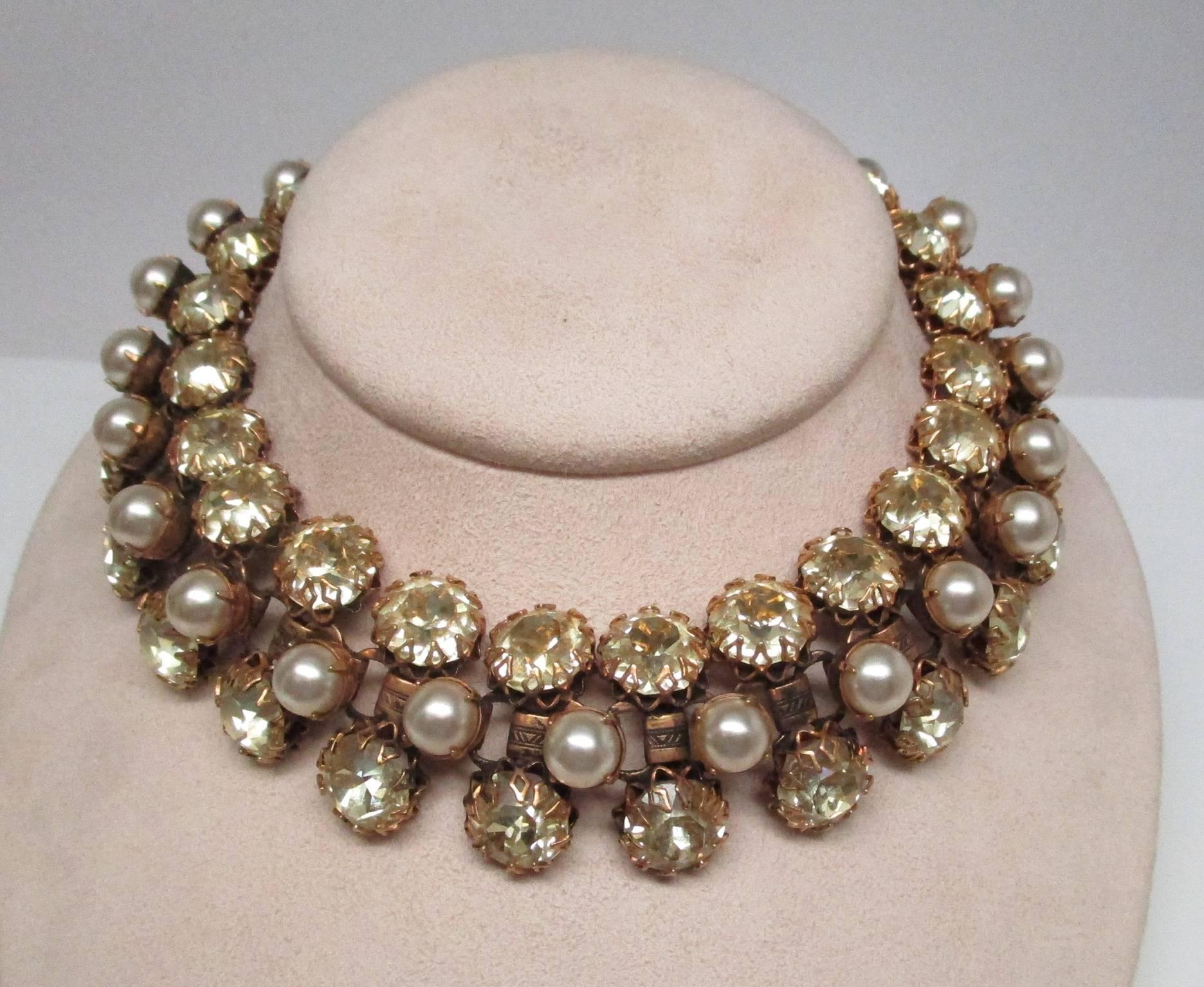 This is a fantastic, big, bold beautiful Deco rhinestone and faux pearl choker necklace by Schreiner of New York. It is bright and flashy, giving you an eye catching look without the worries a necklace of this caliber with genuine gems would. This