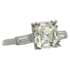 Antique 1925 Art Deco Platinum Asscher and Baguette Diamond Ring with GIA Report