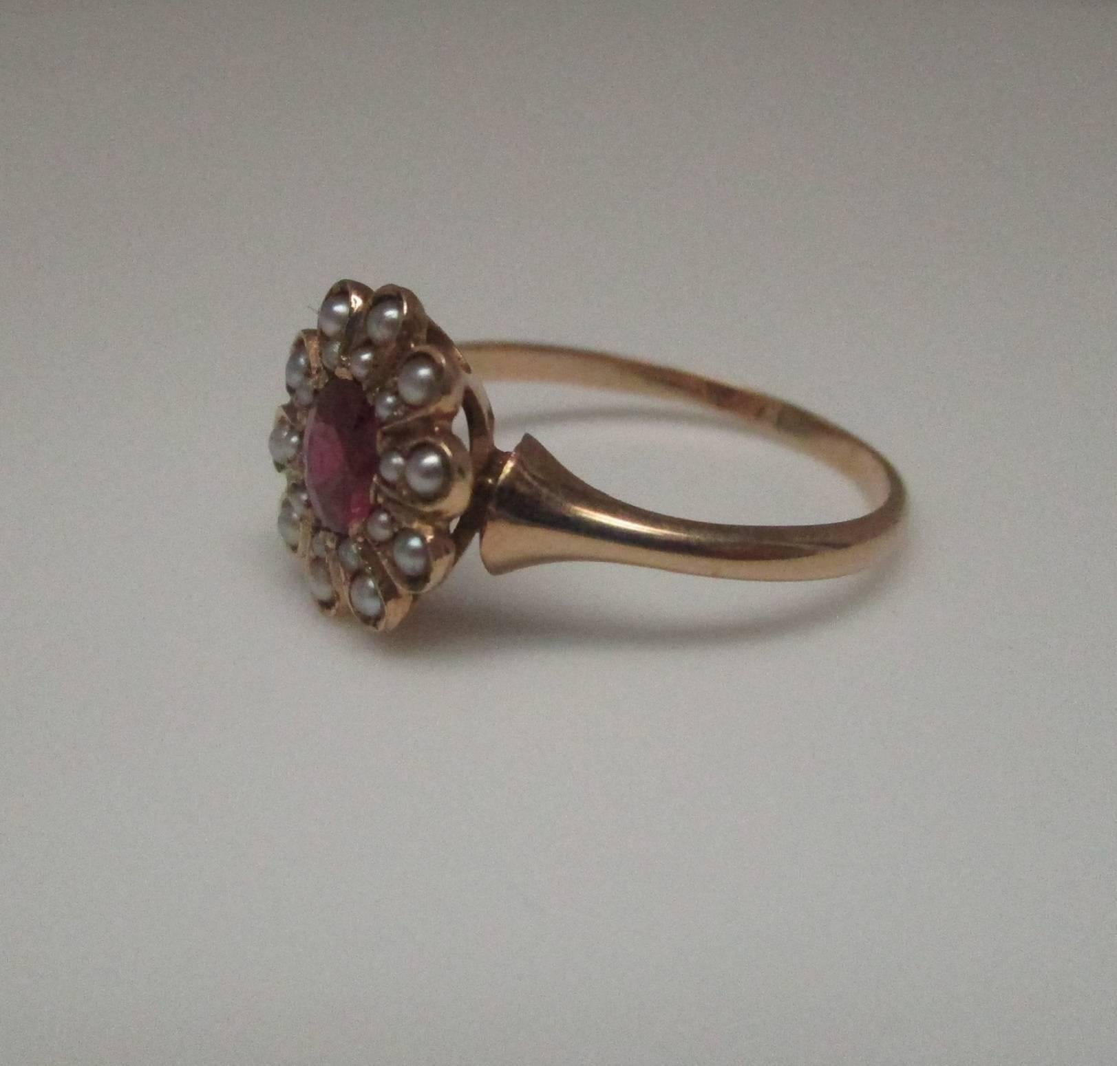 This ring is stunning, the 0.60 carat ruby is a lively red and the seed pearls are in pristine condition. The 18 karat gold means it will you will have this ring for a life time. It sits close to the hand, so it is very comfortable to wear.