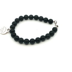 Tiffany & Co. Bracelet avec perles d'onyx noir et pendentif en forme de cœur
