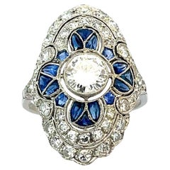 Ring aus Platin mit Wellenschliff, Diamant und Saphiren - 5,4 g