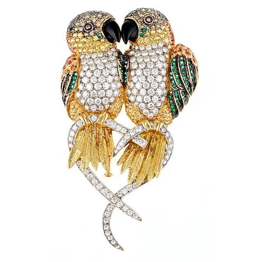 Brilliant Diamond Sapphires and Emerald 18 Karat CAIQUE PARROTS Brooch For Sale