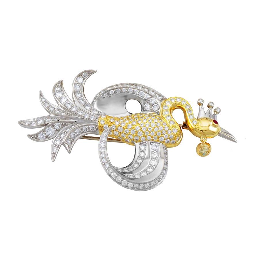 The FIRE BIRD SUITE is comprised of a matching Necklace, Brooch/Pendant and Earrings in diamonds, rubies and 18k gold.

The Fire Bird Legend -- the Bird that consumes itself in flames and is at once recreated as it was before -- figures in the art,