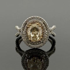 18K White & Yellow Gold Fancy Light Yellow Diamond Ring 2.51ct Oval 0.78ctw Halo