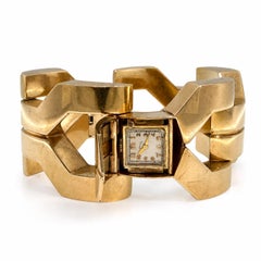 Bracciale vintage in oro giallo 14 carati con maglie larghe, orologio nascosto Schiaparelli Hamilton