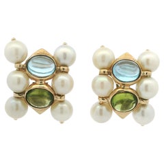 Boucles d'oreilles vintage en or jaune 14K avec perles d'eau douce et péridot.