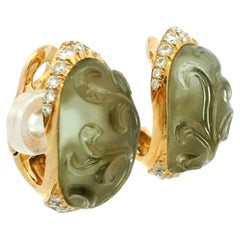 Orecchini a clip con peridoto e diamanti intagliati in oro giallo 18 carati, 2,00 carati