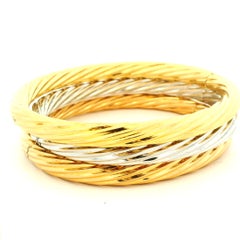 Set of Three 18K Yellow and White Gold Torsade Hinged Bangles