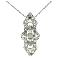 Art Deco Platinum Diamond Filigree Pendant with Baguette Diamonds, circa 1925